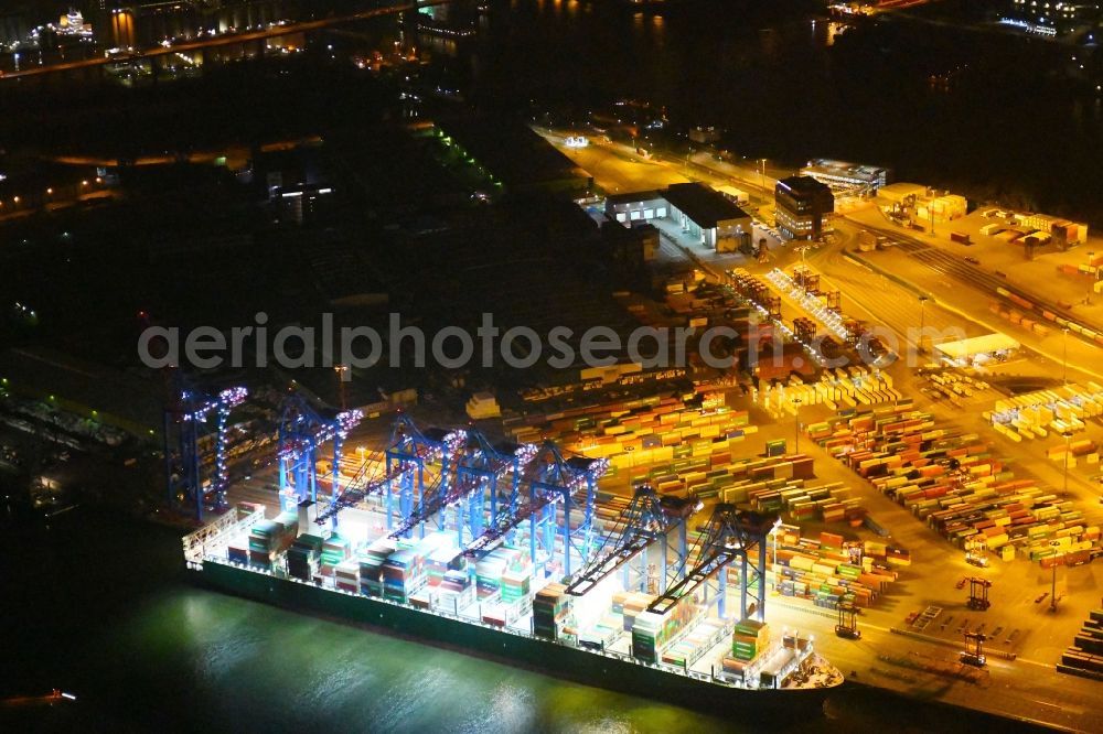 Aerial image at night Hamburg - Night view of Container Terminal in the port of the international port of HHLA Logistics Container Terminal Eurogate in Hamburg