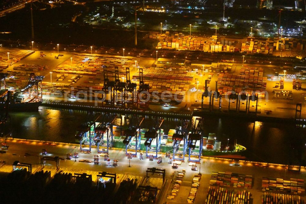 Hamburg at night from above - Night view of Container Terminal in the port of the international port of HHLA Logistics Container Terminal Eurogate in Hamburg