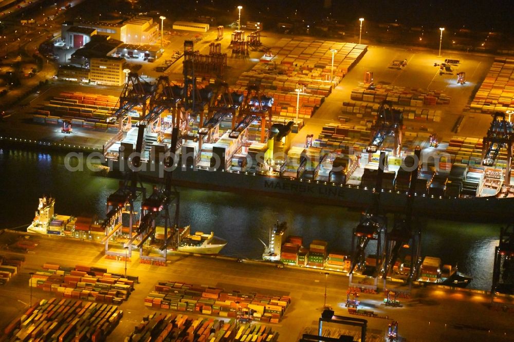 Hamburg at night from above - Night view of Container Terminal in the port of the international port of HHLA Logistics Container Terminal Eurogate in Hamburg