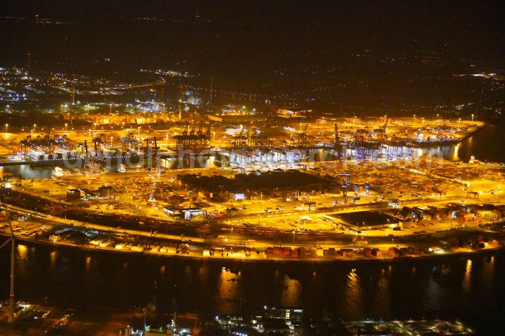 Aerial photograph at night Hamburg - Night view of Container Terminal in the port of the international port of HHLA Logistics Container Terminal Eurogate in Hamburg