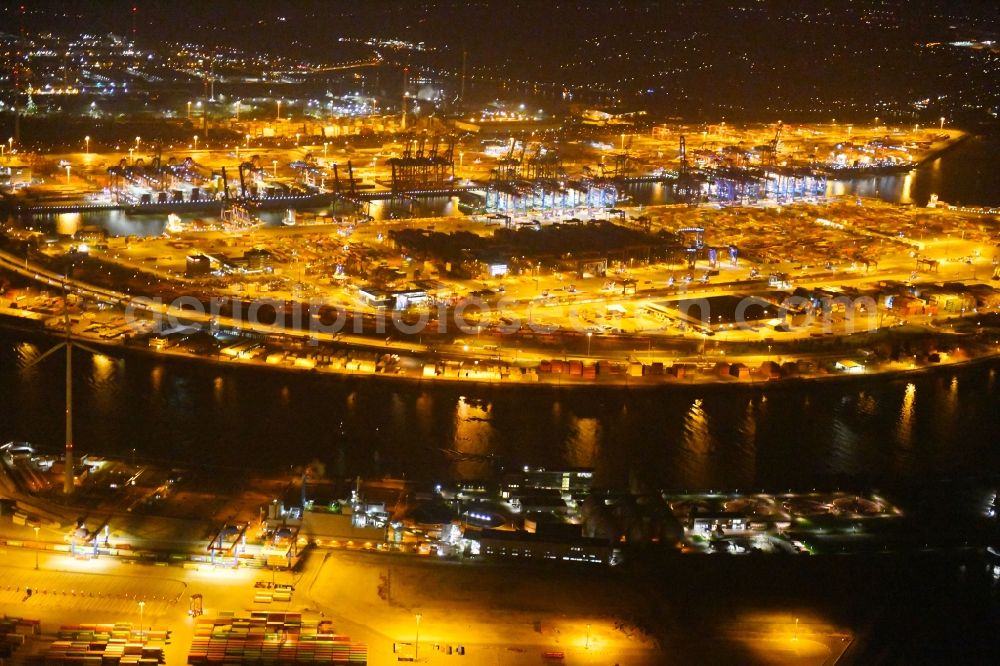 Aerial image at night Hamburg - Night view of Container Terminal in the port of the international port of HHLA Logistics Container Terminal Eurogate in Hamburg