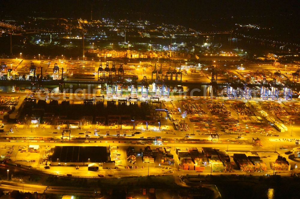 Aerial photograph at night Hamburg - Night view of Container Terminal in the port of the international port of HHLA Logistics Container Terminal Eurogate in Hamburg