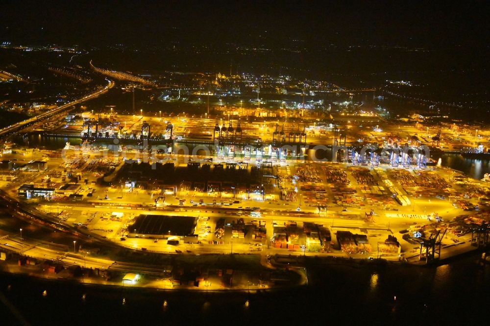 Aerial image at night Hamburg - Night view of Container Terminal in the port of the international port of HHLA Logistics Container Terminal Eurogate in Hamburg