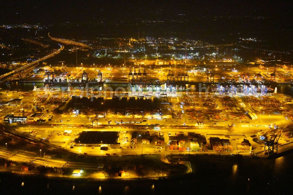 Hamburg at night from above - Night view of Container Terminal in the port of the international port of HHLA Logistics Container Terminal Eurogate in Hamburg