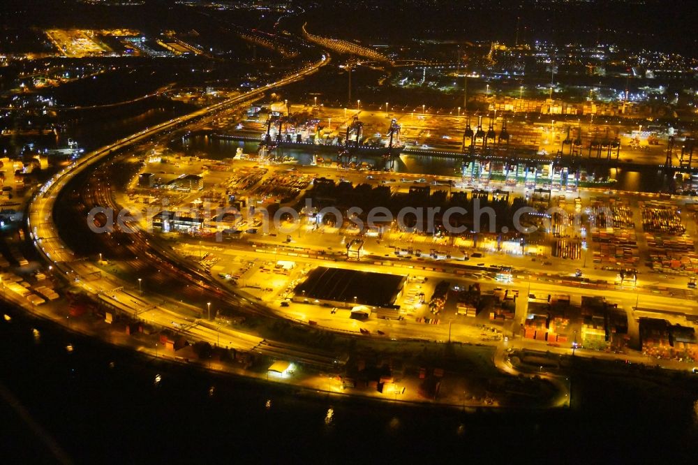 Aerial photograph at night Hamburg - Night view of Container Terminal in the port of the international port of HHLA Logistics Container Terminal Eurogate in Hamburg