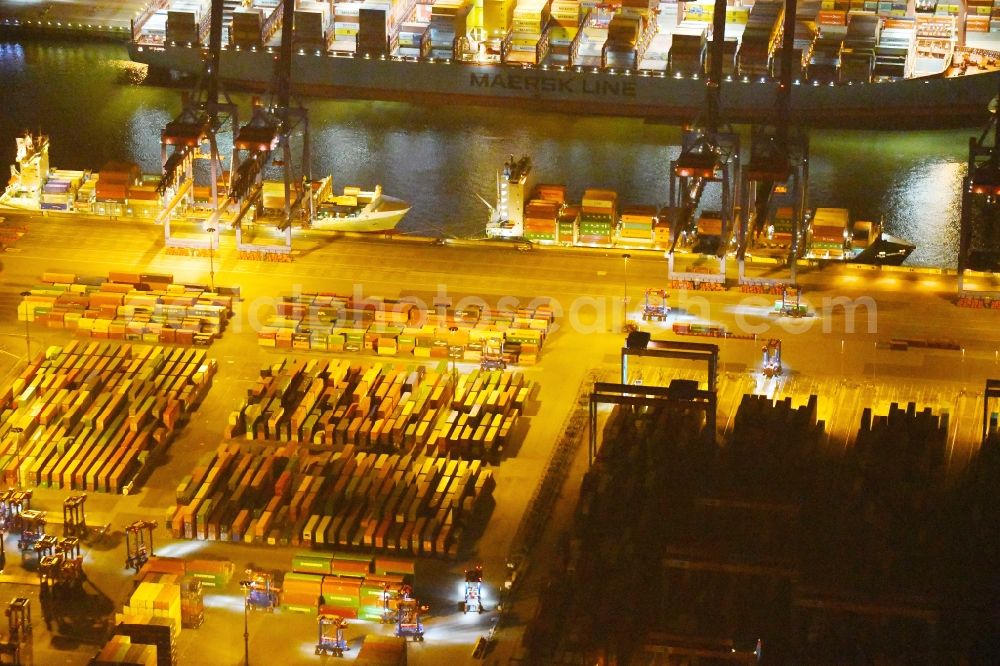 Hamburg at night from above - Night view of Container Terminal in the port of the international port of HHLA Logistics Container Terminal Eurogate in Hamburg