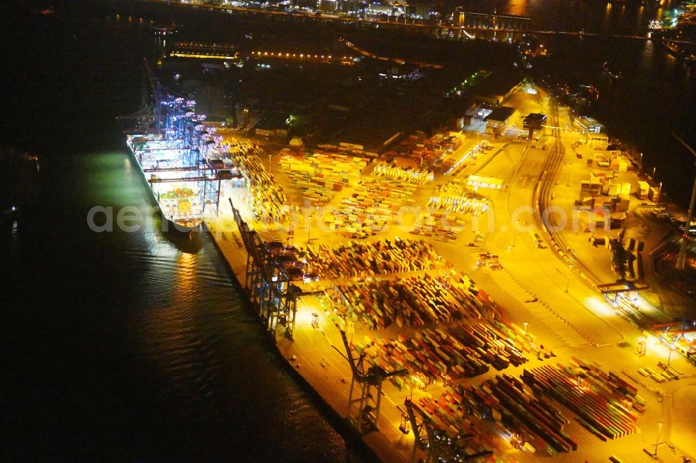 Aerial image at night Hamburg - Night view of Container Terminal in the port of the international port of HHLA Logistics Container Terminal Eurogate in Hamburg