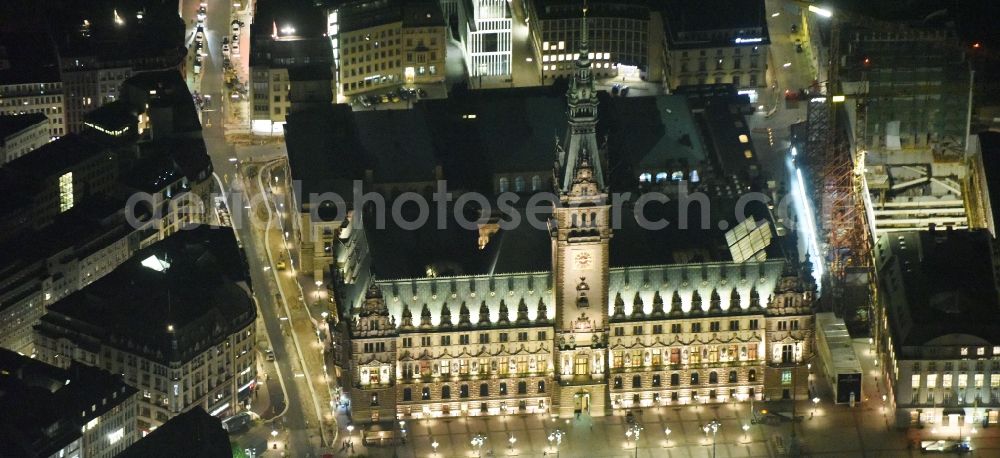 Aerial photograph at night Hamburg - Night view of Town Hall building of the City Council at the market downtown in Hamburg