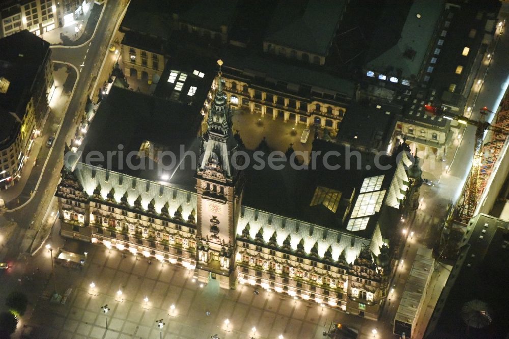 Hamburg at night from the bird perspective: Night view of Town Hall building of the City Council at the market downtown in Hamburg