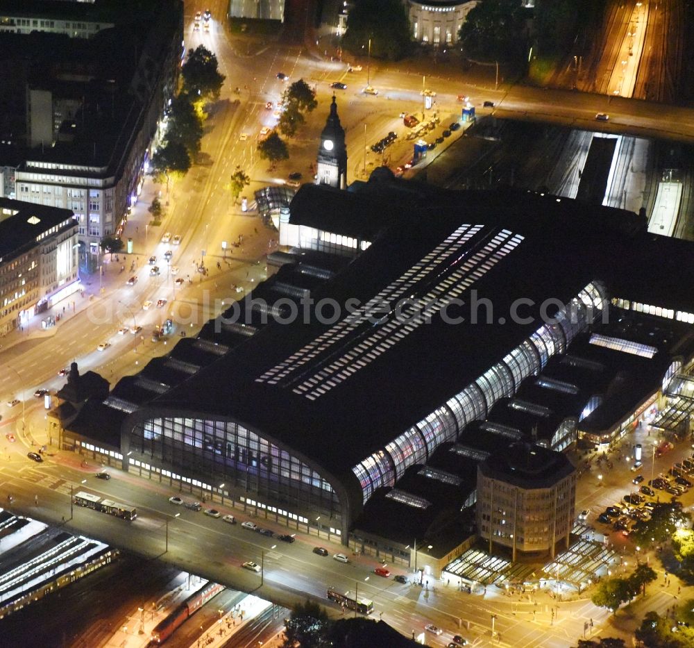 Hamburg at night from the bird perspective: Night view of Track progress and building of the main station of the railway in Hamburg