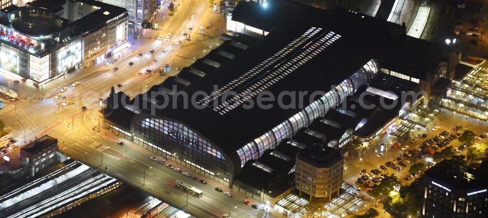 Aerial image at night Hamburg - Night view of Track progress and building of the main station of the railway in Hamburg