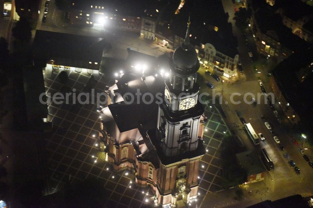 Hamburg at night from the bird perspective: Night view Church building Hauptkirche St. Michaelis on street Englische Planke in Hamburg