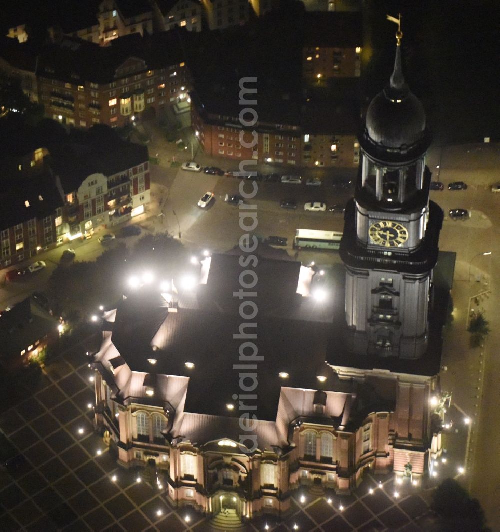 Aerial image at night Hamburg - Night view Church building Hauptkirche St. Michaelis on street Englische Planke in Hamburg