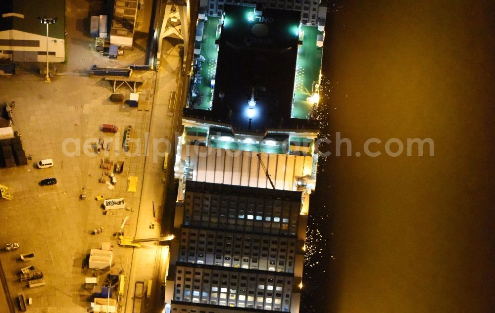 Aerial photograph at night Hamburg - Night view Container ship Trollerort - Steinwerder shore of Norderelbe port aerea in Hamburg