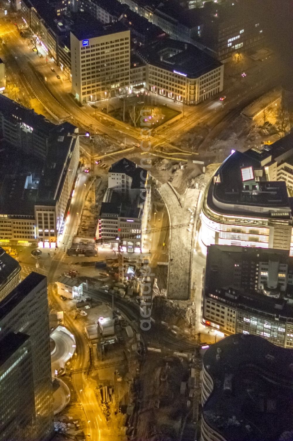 Düsseldorf at night from the bird perspective: Construction for the demolition of the old traffic tangent Tausendfüßler in downtown Dusseldorf in North Rhine-Westphalia