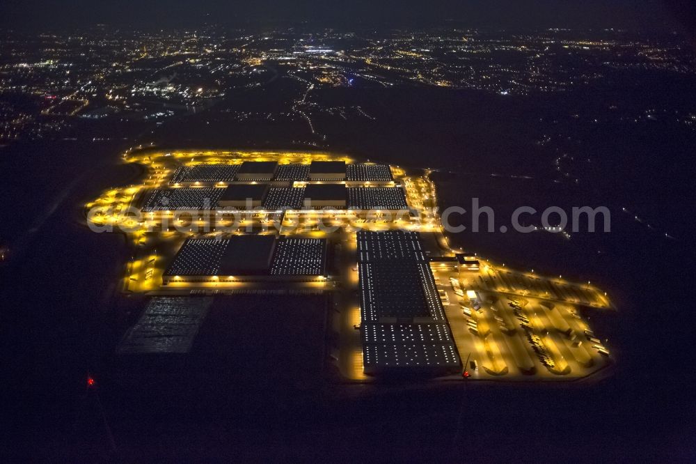 Aerial image at night Dortmund - Night view at the distribution centre of IKEA, which was built on a former heap