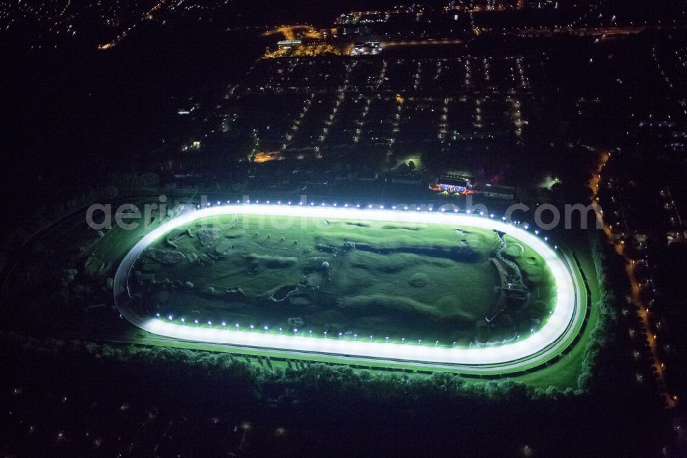 Aerial photograph at night Dortmund - Night Aerial view of the racecourse with Wambel Golfanalage indoors in Dortmund in North Rhine-Westphalia