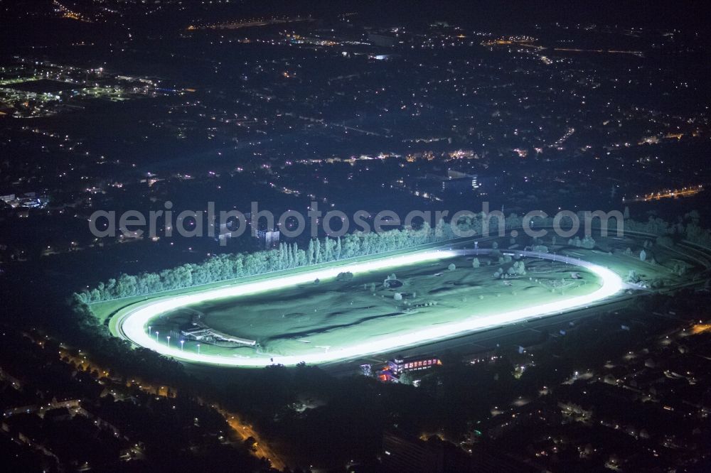 Aerial photograph at night Dortmund - Night Aerial view of the racecourse with Wambel Golfanalage indoors in Dortmund in North Rhine-Westphalia