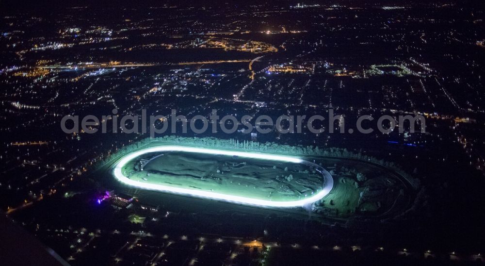 Aerial image at night Dortmund - Night Aerial view of the racecourse with Wambel Golfanalage indoors in Dortmund in North Rhine-Westphalia