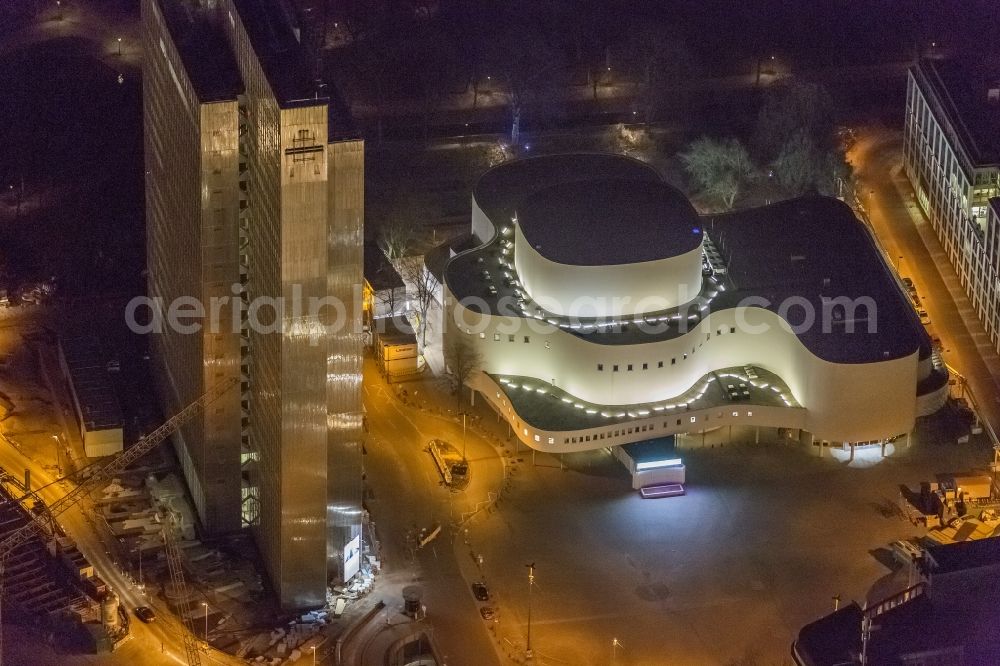 Aerial photograph at night Düsseldorf - Night aerial view of the building of the theater and of the high-rise Dreischeibenhaus in downtown Dusseldorf in North Rhine-Westphalia