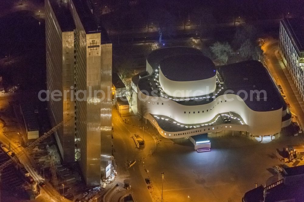 Aerial image at night Düsseldorf - Night aerial view of the building of the theater and of the high-rise Dreischeibenhaus in downtown Dusseldorf in North Rhine-Westphalia