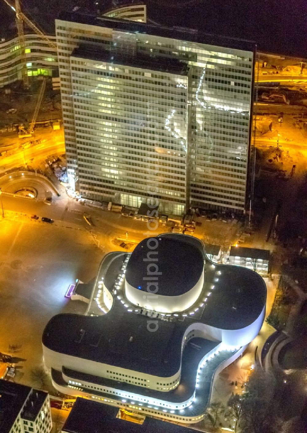 Aerial photograph at night Düsseldorf - Night aerial view of the building of the theater and of the high-rise Dreischeibenhaus in downtown Dusseldorf in North Rhine-Westphalia