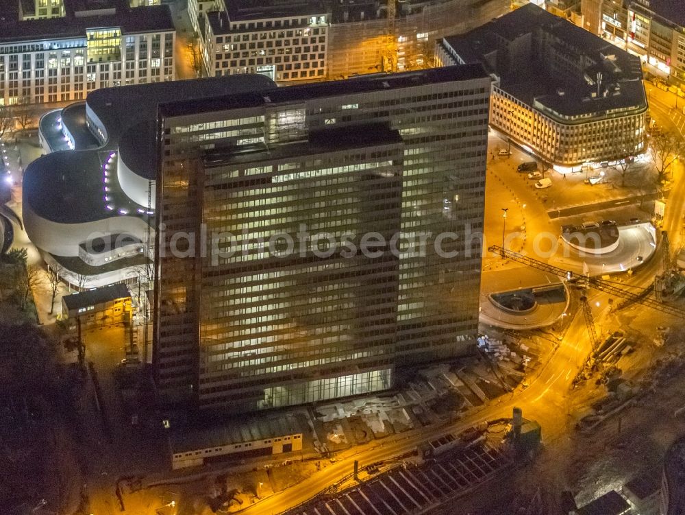 Aerial photograph at night Düsseldorf - Night aerial view of the building of the theater and of the high-rise Dreischeibenhaus in downtown Dusseldorf in North Rhine-Westphalia