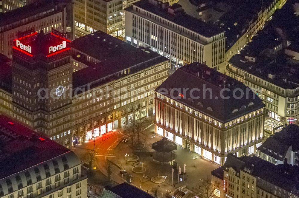 Aerial image at night Düsseldorf - Night aerial view of the building of Wilhelm Marx House and Carschhaus at the Heinrich-Heine-Allee in Dusseldorf in North Rhine-Westphalia NRW