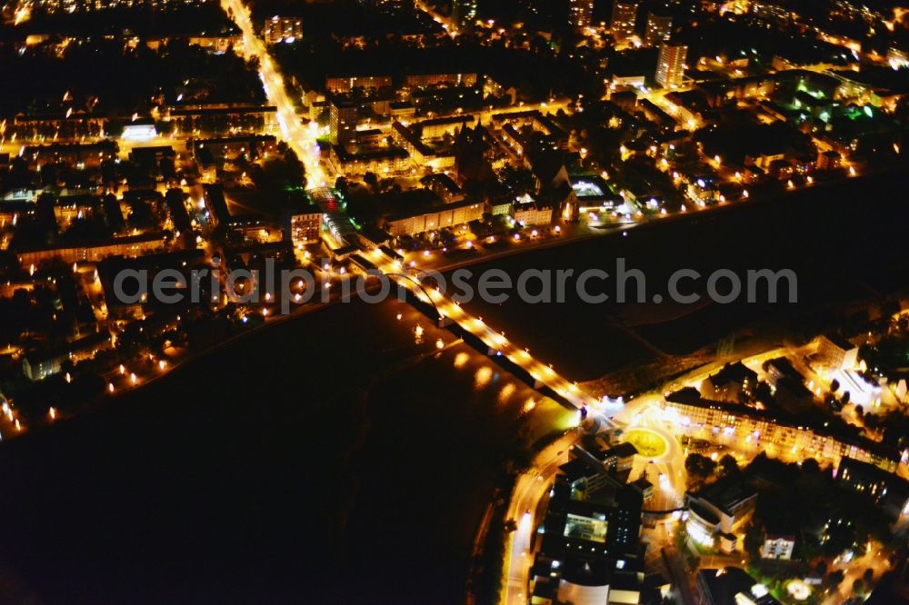 Frankfurt Oder at night from above - Night city view from the center of downtown in Frankfurt Oder in Brandenburg. View of the town bridge in Frankfurt Oder in the federal state of Brandenburg. The bridge connects the cities of Frankfurt Oder and Slubice