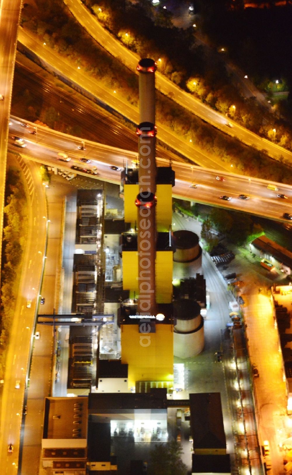 Aerial image at night Berlin-Wilmersdor - Yellow / Orange Night shot of a power plant in the district of Charlottenburg-Wilmersdorf. Operator is Vattenfall Europe AG. The heating plant is located on the Forckenbeckstrasse in Berlin