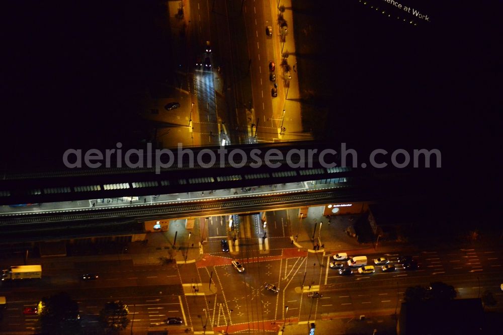 Berlin at night from above - Night view S-Bahnhof Adlershof at the intersection Adlergestell corner Rudow Chaussee in Berlin