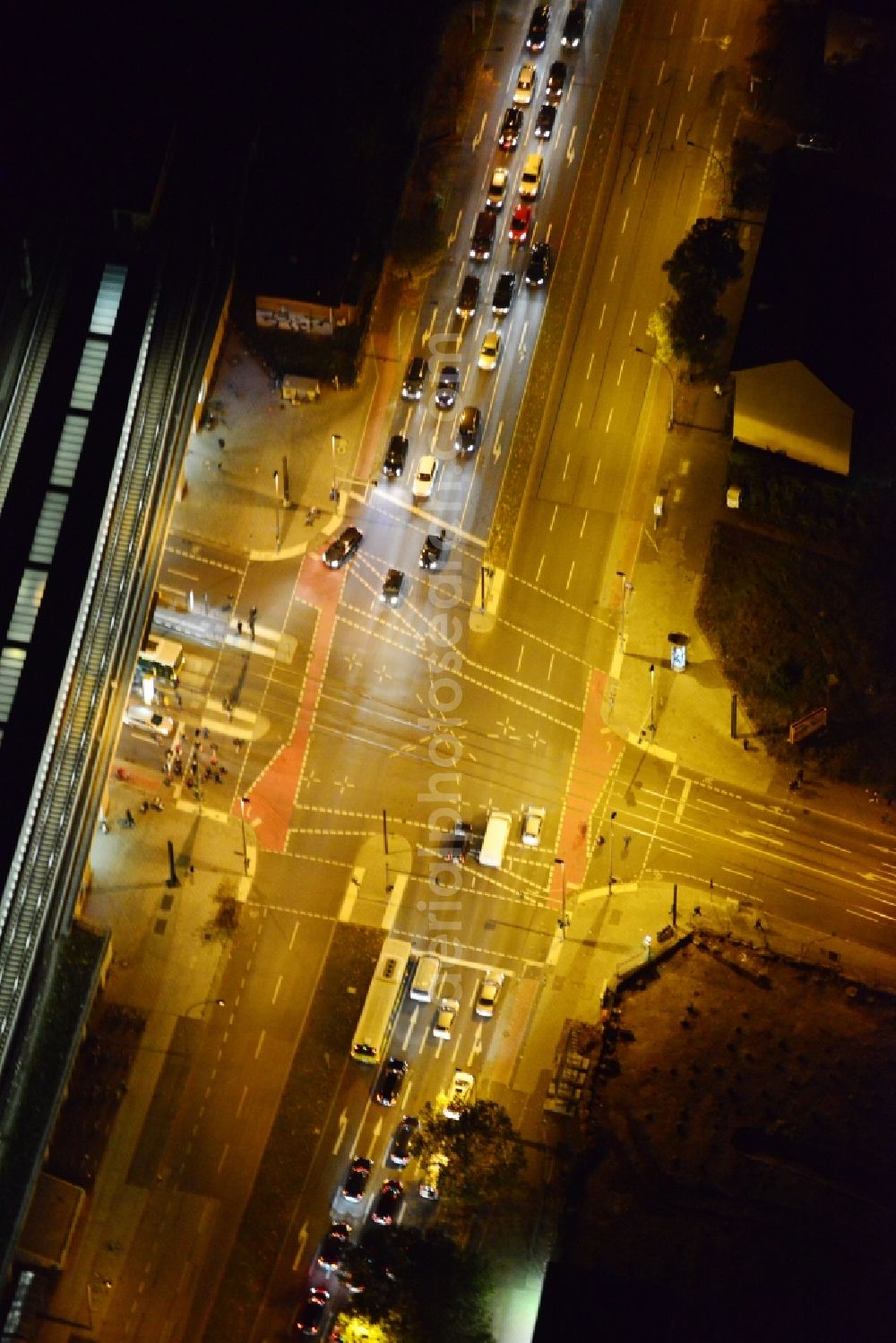 Berlin at night from the bird perspective: Night view S-Bahnhof Adlershof at the intersection Adlergestell corner Rudow Chaussee in Berlin