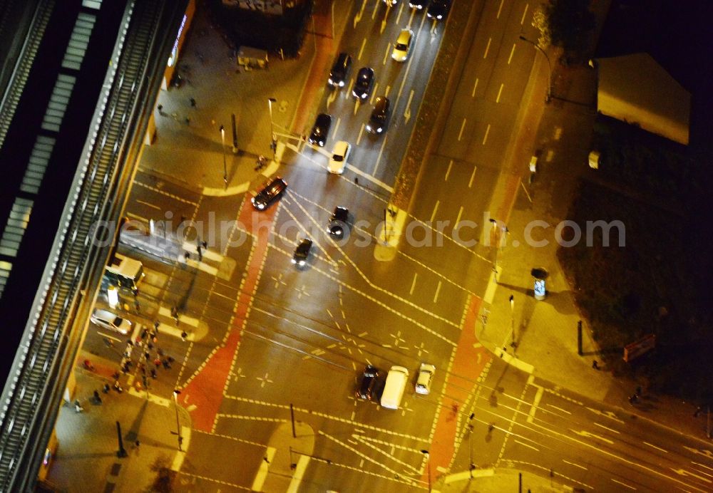 Aerial photograph at night Berlin - Night view S-Bahnhof Adlershof at the intersection Adlergestell corner Rudow Chaussee in Berlin