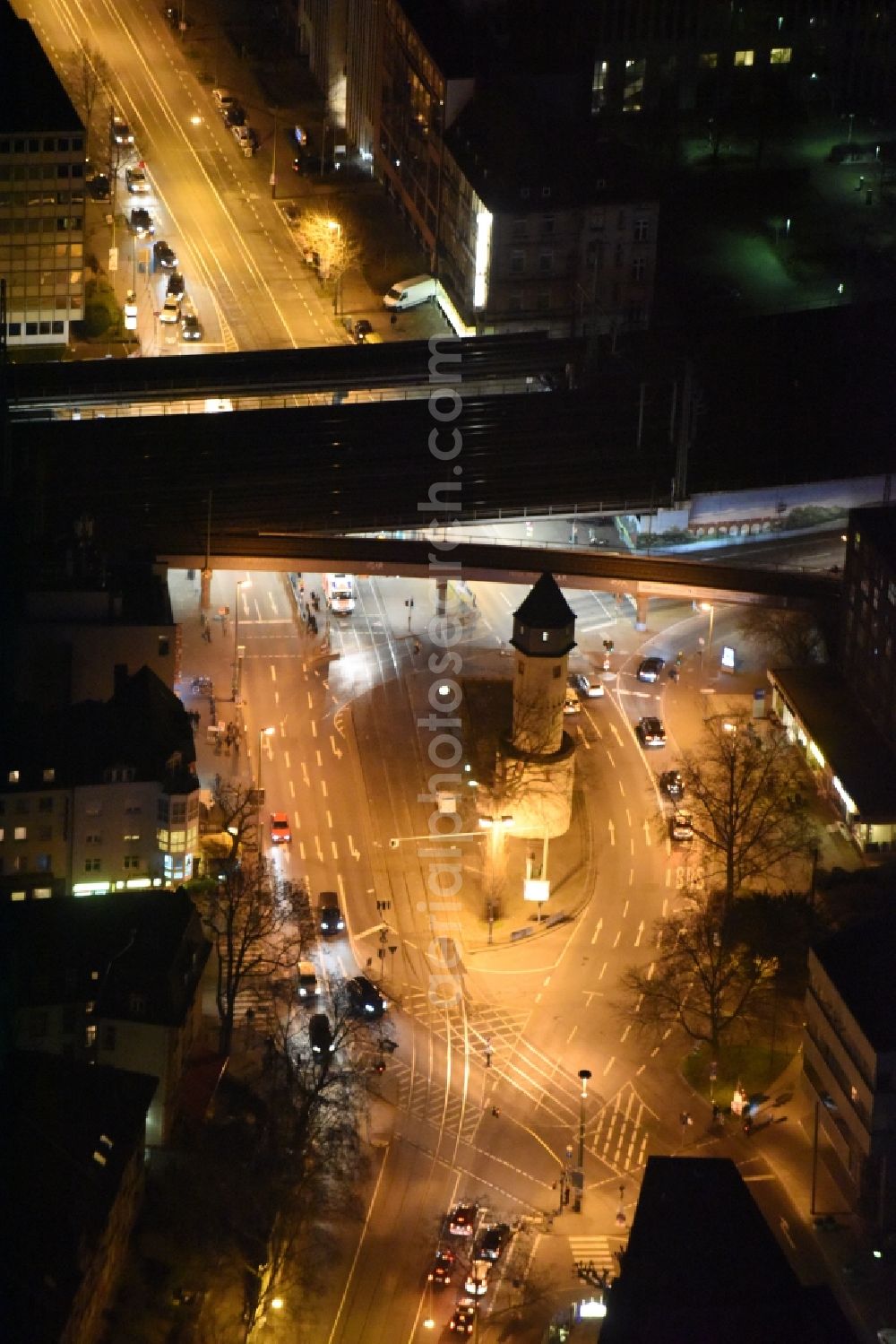 Aerial photograph at night Frankfurt am Main - Night view Station building and track systems of the S-Bahn station Galluswarte on Mainzer Landstrasse in Frankfurt in the state Hesse