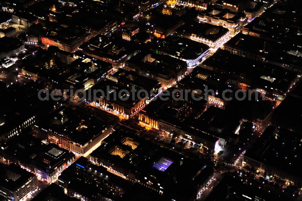 Berlin at night from above - Night view of downtown east around the Gendarmenmarkt in the district Mitte in Berlin. The Gendarmenmarkt, occasional called the most beautiful square in Berlin, is a place in the historical center of Berlin