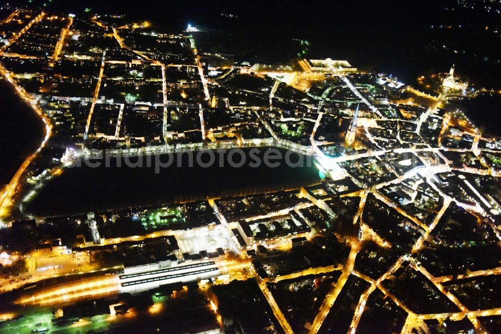 Aerial image at night Schwerin - Night view riparian areas on the lake area of Pfaffenteich in Schwerin in the state Mecklenburg - Western Pomerania