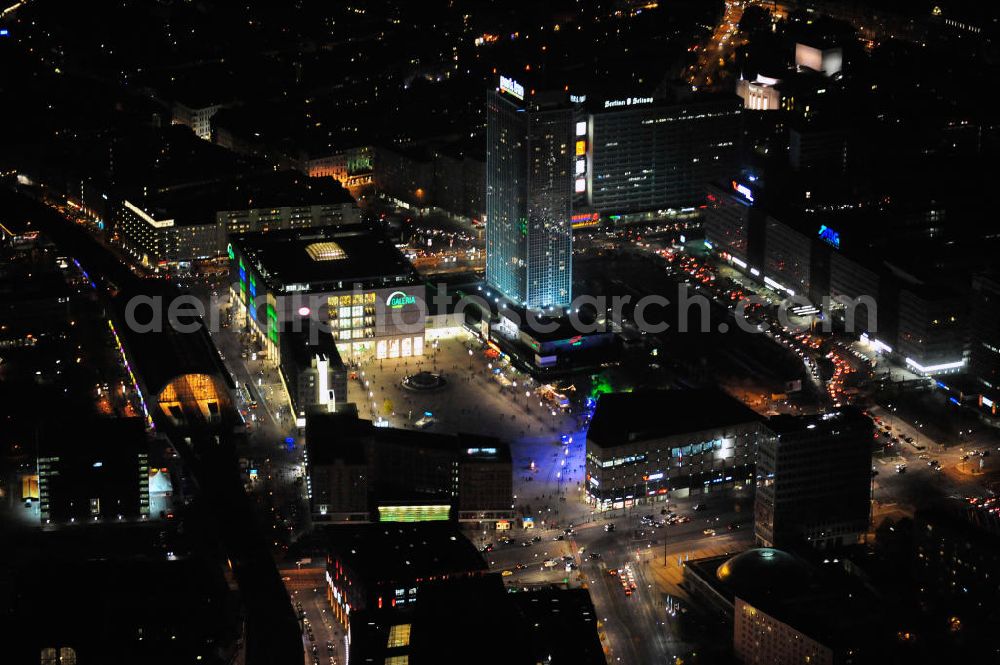 Aerial photograph at night Berlin - Nachtaufnahme: Sicht auf den Alexanderplatz mit dem Kaufhaus Alexa und mit Galeria Kaufhof, dem Bahnhof und dem Park Inn Hotel anlässlich des Festival Of Lights 2010 in Berlin. Nightshot: View to the shopping malls Alexa and Galeria Kaufhof, the train station and the Park Inn Hotel at the Alexanderplatz in celebration of the Festival Of Lights 2010 in Berlin.