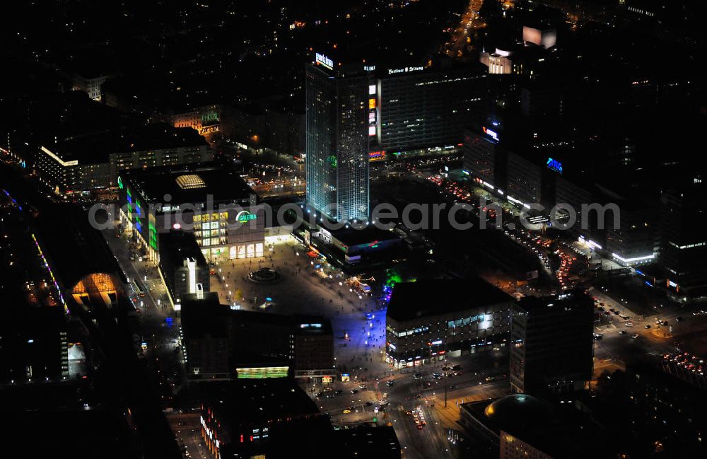 Aerial image at night Berlin - Nachtaufnahme: Sicht auf den Alexanderplatz mit dem Kaufhaus Alexa und mit Galeria Kaufhof, dem Bahnhof und dem Park Inn Hotel anlässlich des Festival Of Lights 2010 in Berlin. Nightshot: View to the shopping malls Alexa and Galeria Kaufhof, the train station and the Park Inn Hotel at the Alexanderplatz in celebration of the Festival Of Lights 2010 in Berlin.