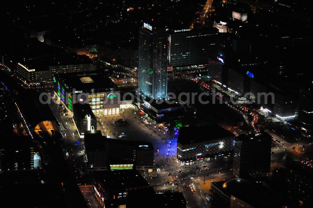 Berlin at night from above - Nachtaufnahme: Sicht auf den Alexanderplatz mit dem Kaufhaus Alexa und mit Galeria Kaufhof, dem Bahnhof und dem Park Inn Hotel anlässlich des Festival Of Lights 2010 in Berlin. Nightshot: View to the shopping malls Alexa and Galeria Kaufhof, the train station and the Park Inn Hotel at the Alexanderplatz in celebration of the Festival Of Lights 2010 in Berlin.