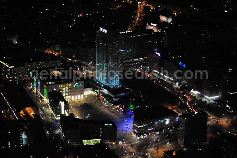 Aerial photograph at night Berlin - Nachtaufnahme: Sicht auf den Alexanderplatz mit dem Kaufhaus Alexa und mit Galeria Kaufhof, dem Bahnhof und dem Park Inn Hotel anlässlich des Festival Of Lights 2010 in Berlin. Nightshot: View to the shopping malls Alexa and Galeria Kaufhof, the train station and the Park Inn Hotel at the Alexanderplatz in celebration of the Festival Of Lights 2010 in Berlin.