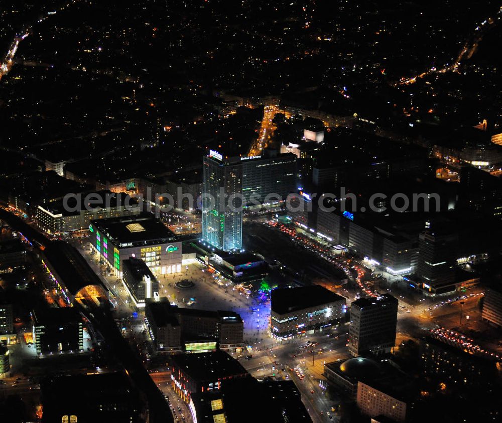 Aerial image at night Berlin - Nachtaufnahme: Sicht auf den Alexanderplatz mit dem Kaufhaus Alexa und mit Galeria Kaufhof, dem Bahnhof und dem Park Inn Hotel anlässlich des Festival Of Lights 2010 in Berlin. Nightshot: View to the shopping malls Alexa and Galeria Kaufhof, the train station and the Park Inn Hotel at the Alexanderplatz in celebration of the Festival Of Lights 2010 in Berlin.