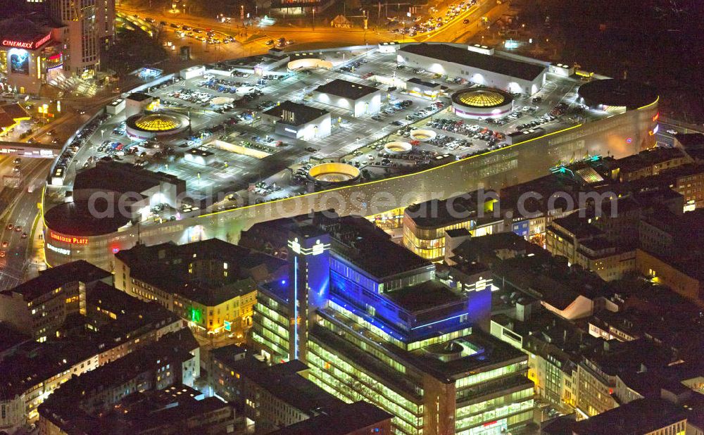 Essen at night from the bird perspective: Nachtaufnahme Einkaufszentrum Limbecker Platz in Essen. Das Essener Shoppingcenter ist ein Projekt der ECE Projektmanagement GmbH & Co. KG. Night Scene Limbeckerplatz shopping center in Essen.