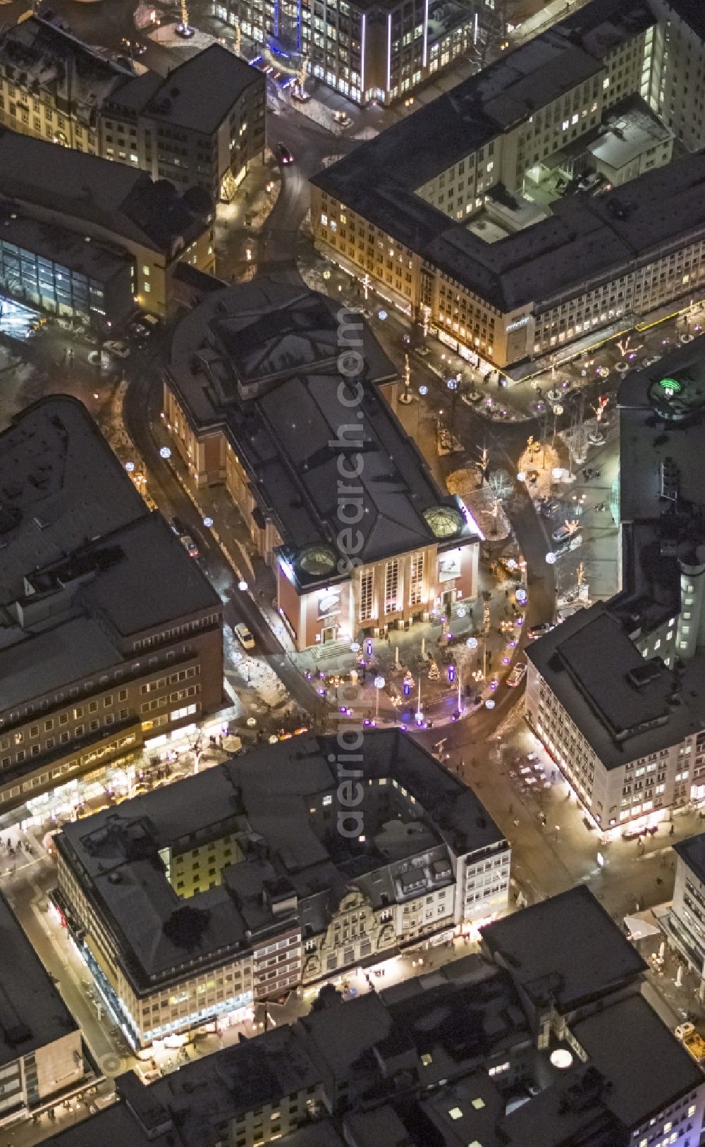 Essen at night from the bird perspective: Night view of the building of the Grillo Theatre on Theatre Square in Essen in North Rhine-Westphalia