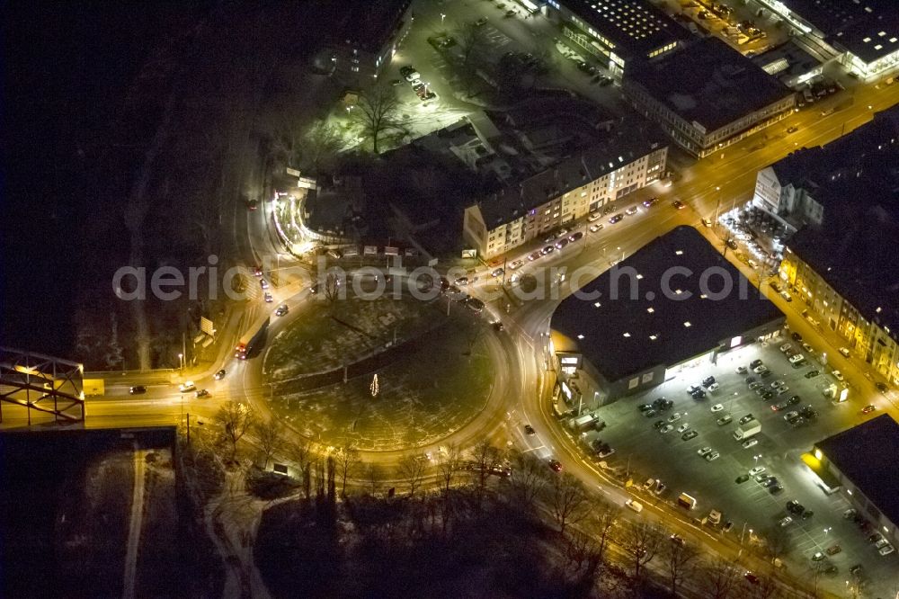 Aerial image at night Duisburg - Night view from the roundabout at the Ruhrorter in Duisburg in North Rhine-Westphalia