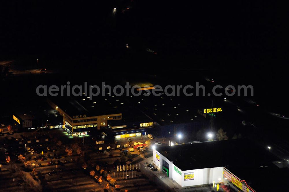 Waltersdorf at night from above - Nachtaufnahme: Blick auf das IKEA Einrichtungshaus im Gewerbegebiet Airport Center Waltersdorf in Waltersdorf bei Berlin. Night shot: View of the furniture store IKEA in Waltersdorf.