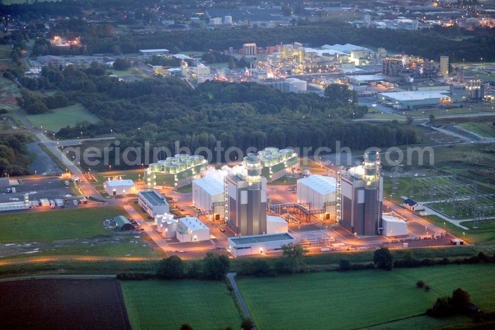 Hamm at night from the bird perspective: Night photograph of Trianel gas and steam power plant in Hamm-Uentrop in North Rhine-Westphalia