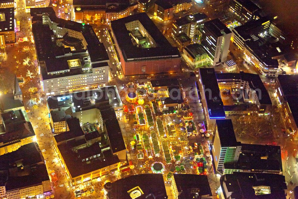 Aerial photograph at night Essen - Nachtaufnahme Weihnachtsmarkt am Kennedyplatz in Essen. Night scene at Kennedy Square Christmas market in Essen.