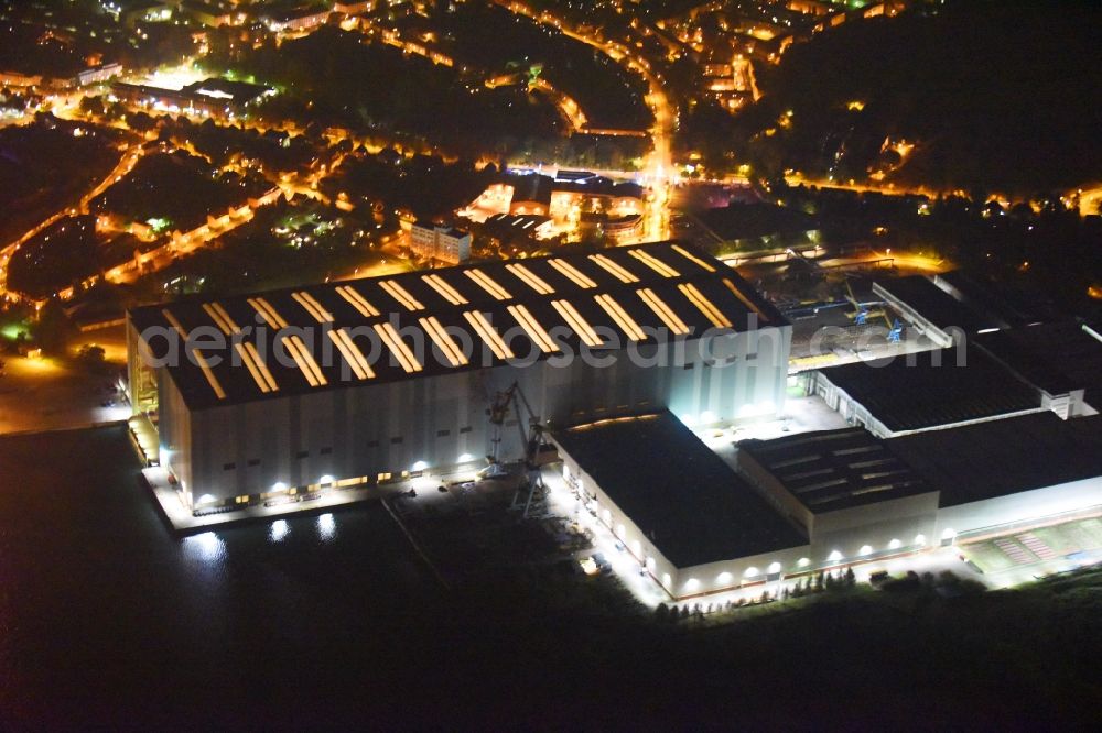 Aerial image at night Wismar - Night view of Shipyard - site of the MV Werften Wismar ( formerly Nordic Yards, Wadan Yards MTW and Aker MTW Werft ) in Wismar in the state Mecklenburg - Western Pomerania, Germany