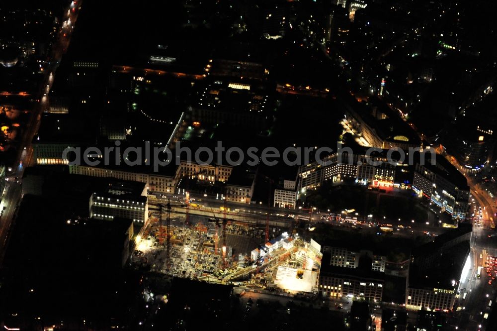 Aerial image at night Berlin - Night view at the construction site of the planned shopping center on the former Wertheim site at Leipziger Platz in the district Mitte in Berlin. Investor HFS real estate commissioned architects Manfred Pechtold, nps Tchoban Voss and PSP architects and engineers with the new building project. Executing construction companies are the WOLFF, BSS concrete formwork system BSS GmbH and FCL Fettchenhauer Controling & Logistics Ltd