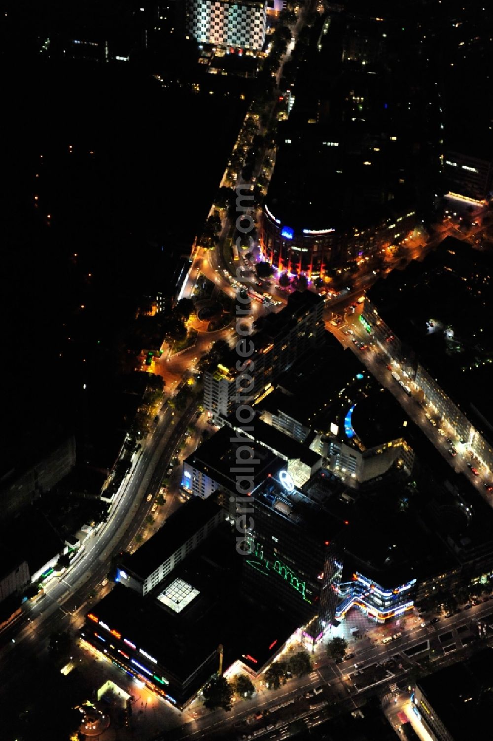 Aerial photograph at night Berlin - Night view at the Hardenbergplatz and the Kurfürstendamm in the district Charlottenburg in Berlin. The Hardenbergplatz is a sub center in the City West